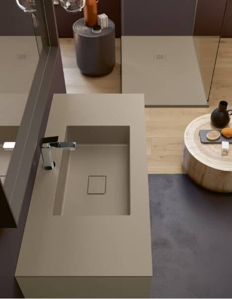 Mineralux Stone shower tray — pleasant textured finish, coloured to match the washbasin for design continuity