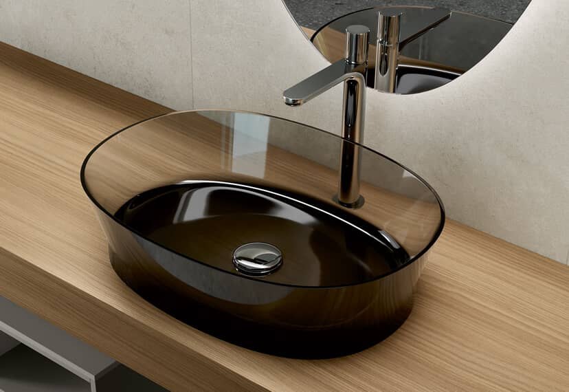 Uniko countertop washbasin — coloured transparent resin: light, transparency and design in a single piece