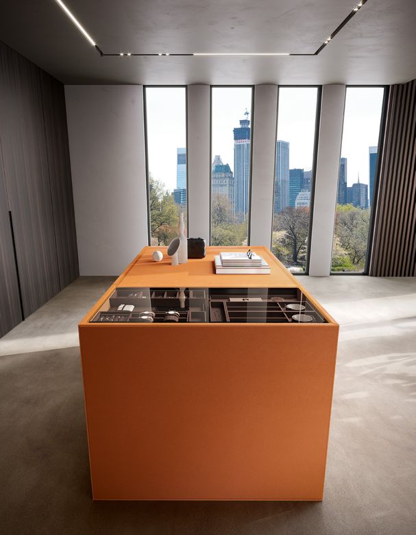 Custom wardrobe — Leather island with glass-topped organiser trays
