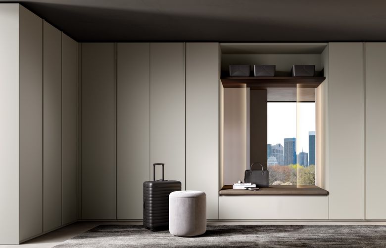 Custom wardrobe — Wardrobe wall with an upholstered window seat