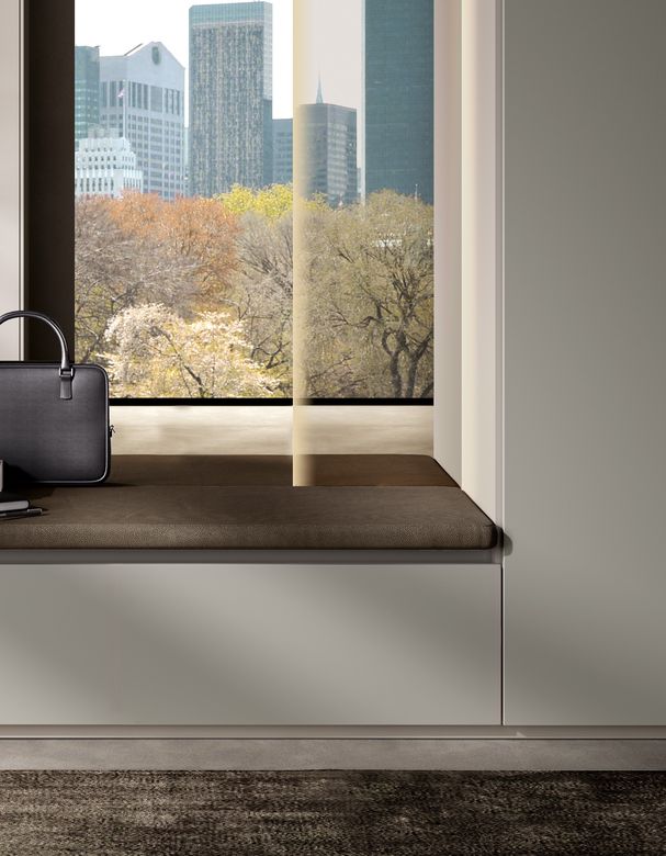 Custom wardrobe — Window-seat bench between wardrobe runs