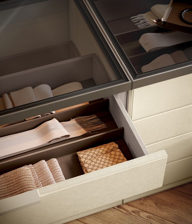 Custom wardrobe — Open drawers with folded knitwear