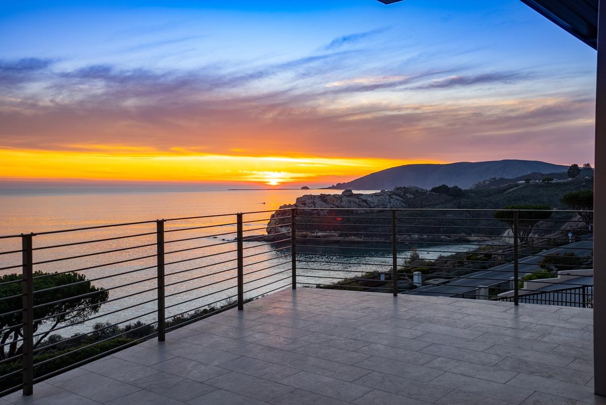 Sunset over the point from the deck rail